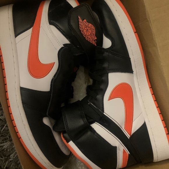 Jordan 1s orange and black Nike